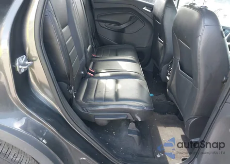 2016 Ford Escape Titanium z USA, uszkodzony, nr VIN 1FMCU9J95GUB85602